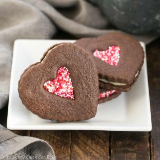 Chocolate Heart Sandwich Cookies | Cocoa cut out cookies filled with white chocolate ganache