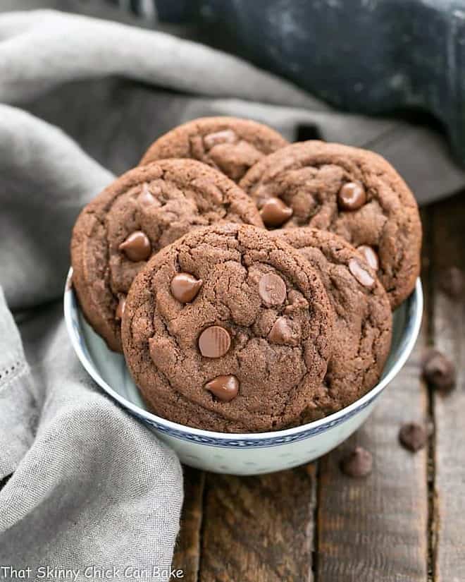 Dark Chocolate Pudding Cookies in a blue and white ceramic bowl.