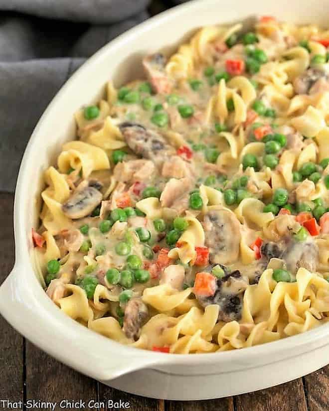 Tuna Noodle Casserole from Scratch - Tuna casserole without soup but instead a delicious creamy cheese sauce! Tuna Noodle Casserole from Scratch close view in casserole dish.
