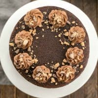 Triple Layer Chocolate Toffee Cake | 3 rich chocolate layers filled with chocolate buttercream and toffee bits