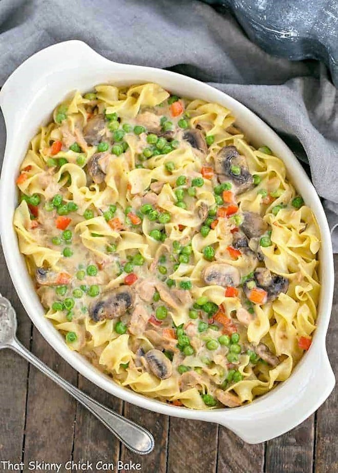 Tuna Noodle Casserole from Scratch | Tuna casserole without soup but instead a delicious creamy cheese sauce! Tuna Noodle Casserole from Scratch in an oval white casserole dish.