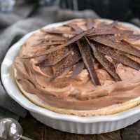 Chocolate Velvet Pie with Meringue Crust in white pie plate