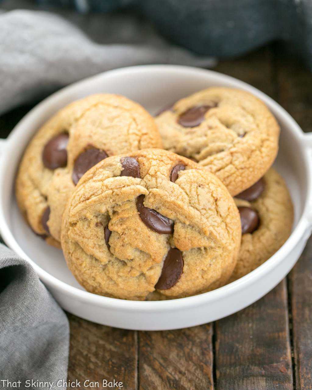 Brown Butter Chocolate Chip Cookies in a white ceramic dish.