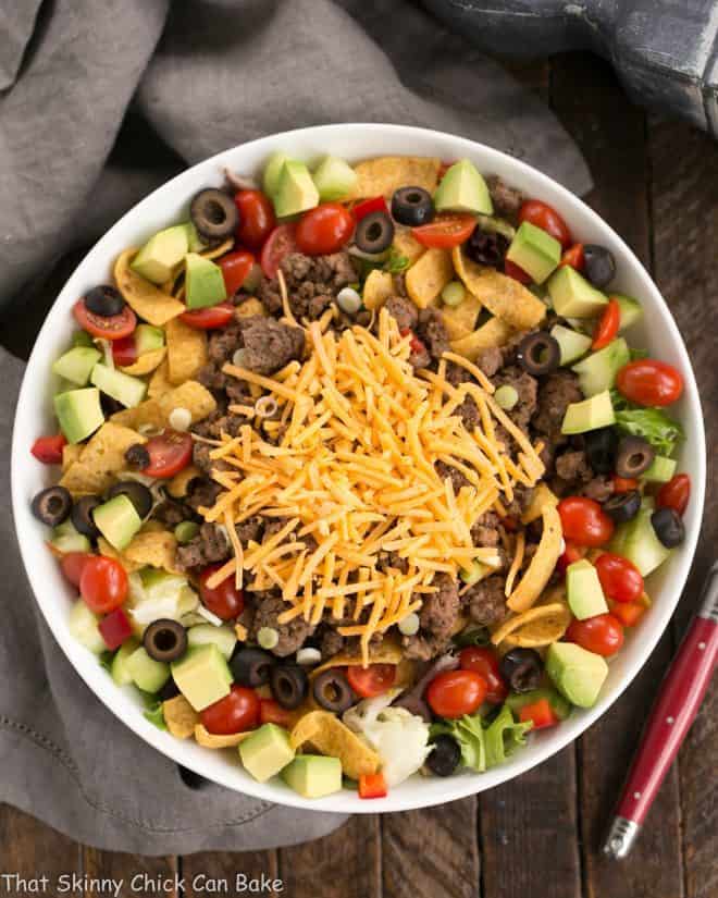 Overhead view of Beef Taco Salad with Salsa Dressing in a white serving bowl