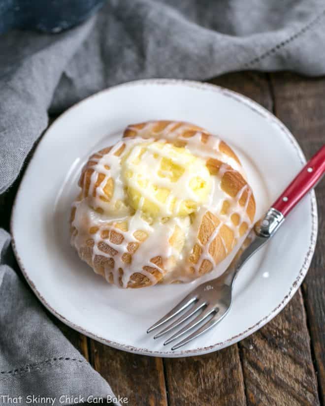 Overhead view of aDanish Twists with Cream Cheese Filling on a white breakfast plate