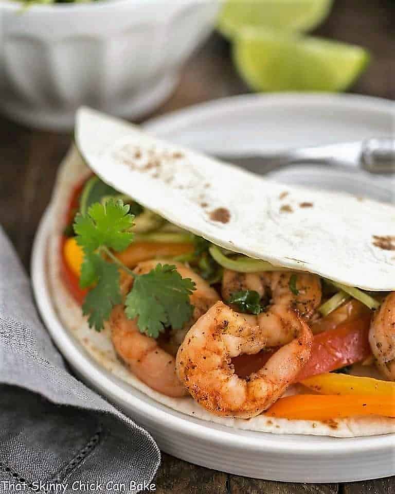 Spicy shrimp Fajitas closeup of filling in a tortilla