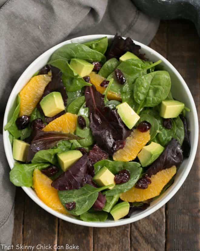 A tasty Citrus Spinach Salad with Avocados and Oranges and a lovely lemon Dijon vinaigrette