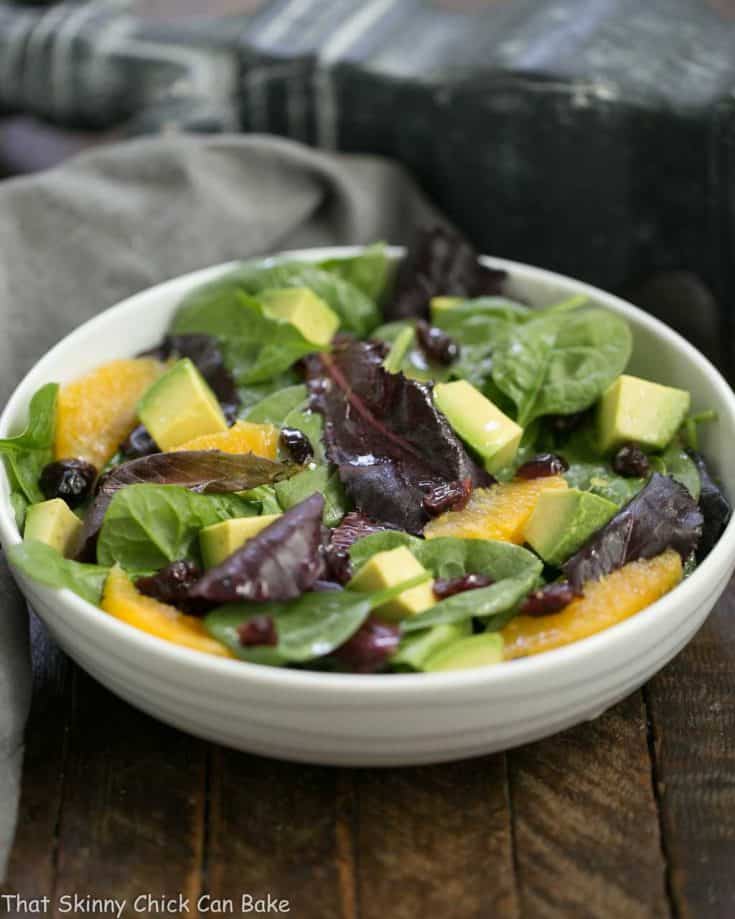 A tasty Citrus Spinach Salad with Avocados and Oranges and a lovely lemon Dijon vinaigrette