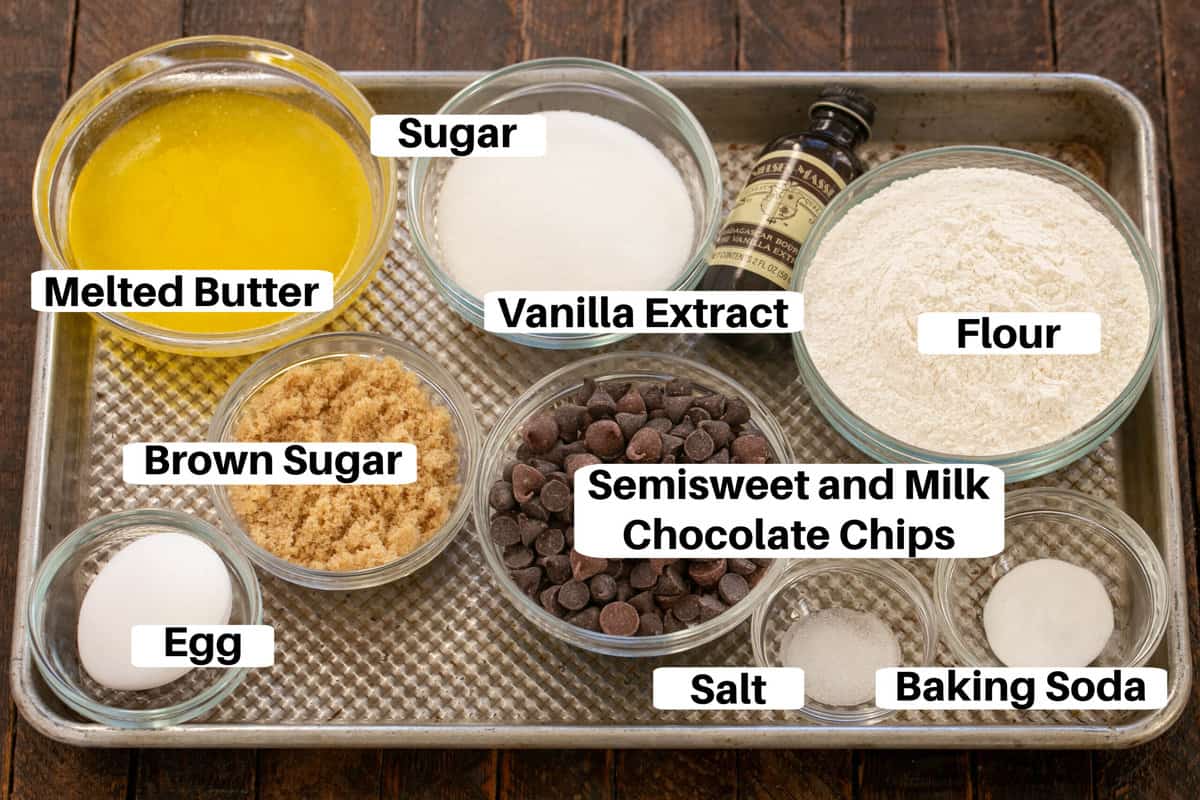 Double Chocolate Chip Cookie Ingredients with labels on a metal sheet pan.