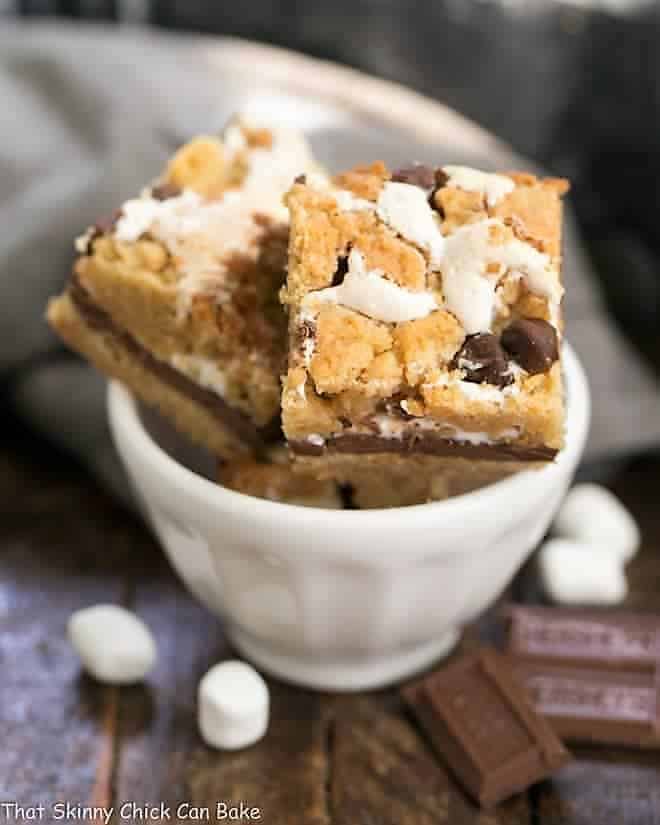 S'mores Cookie Bars in a small white bowl.