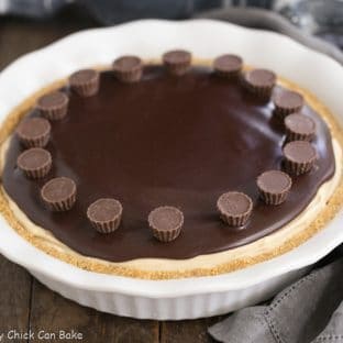 Frozen Chocolate Peanut Butter Pie - Graham cracker crust, dreamy peanut butter filling topped with chocolate ganache