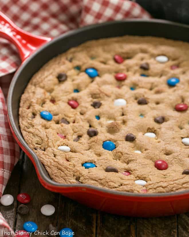 Patriotic Skillet Cookie in a red cast iron skillet.