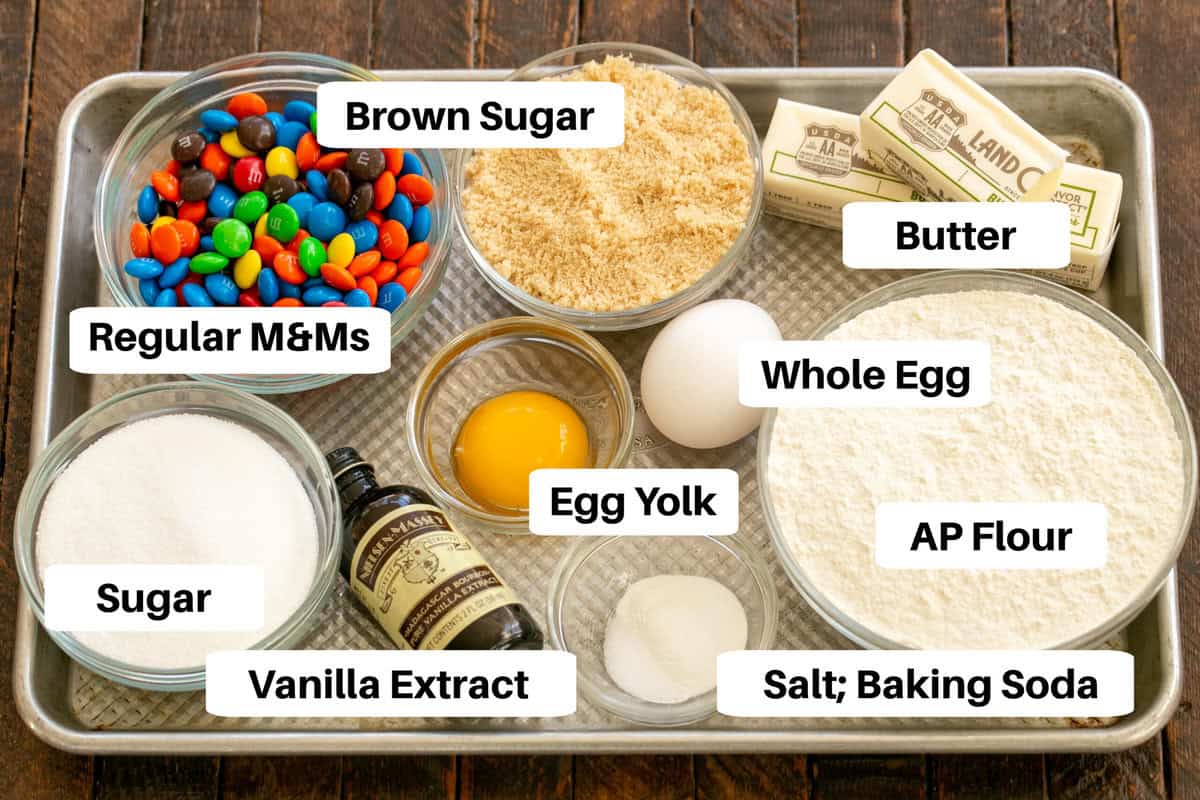 M&M Cookie Ingredients with labels on a sheetpan.
