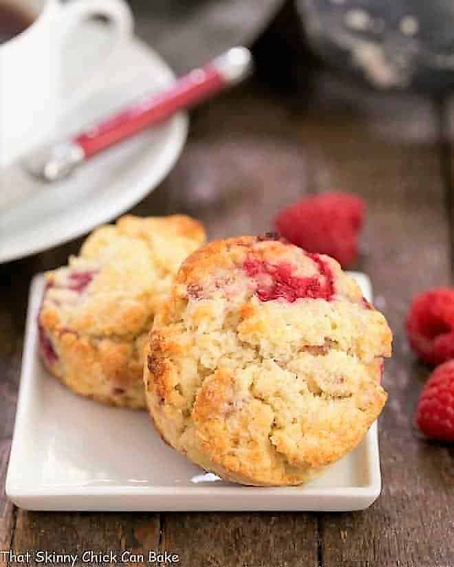 Raspberry Cream Scones on a square white plate.