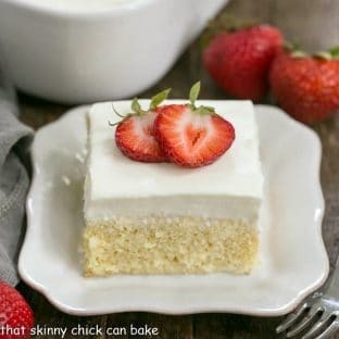 Authentic Tres Leches Cake - A Latin American favorite make with 3 milks, a homemade sponge cake and whipped cream frosting!