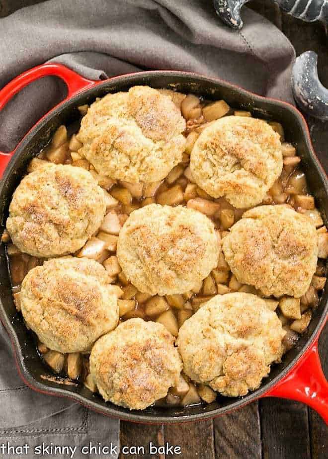 Old-Fashioned Apple Cobbler in a red cast iron skillet