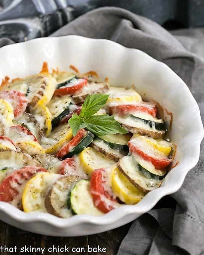 Cheesy Vegetable Tian in a white pie plate