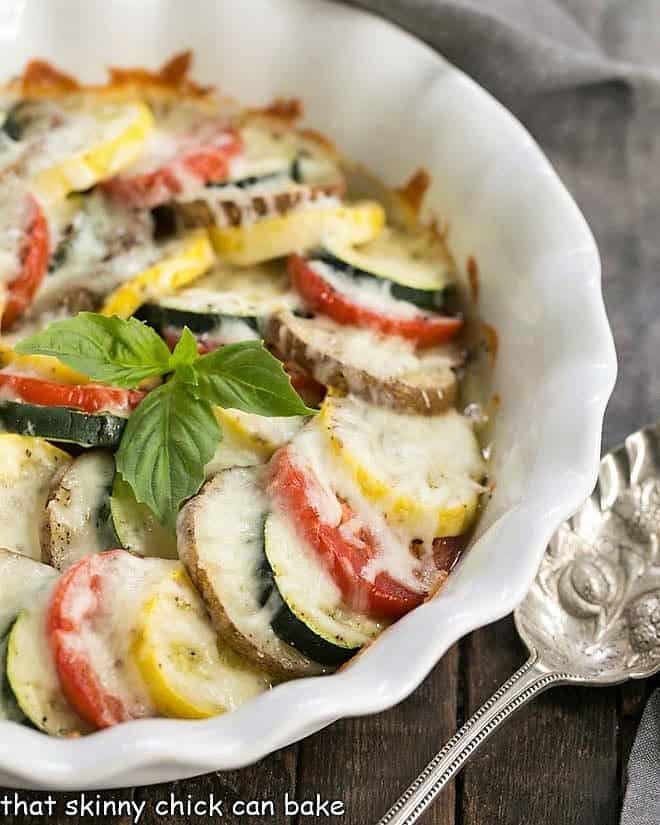 Cheesy Vegetable Tian baked in a fluted white pie plate