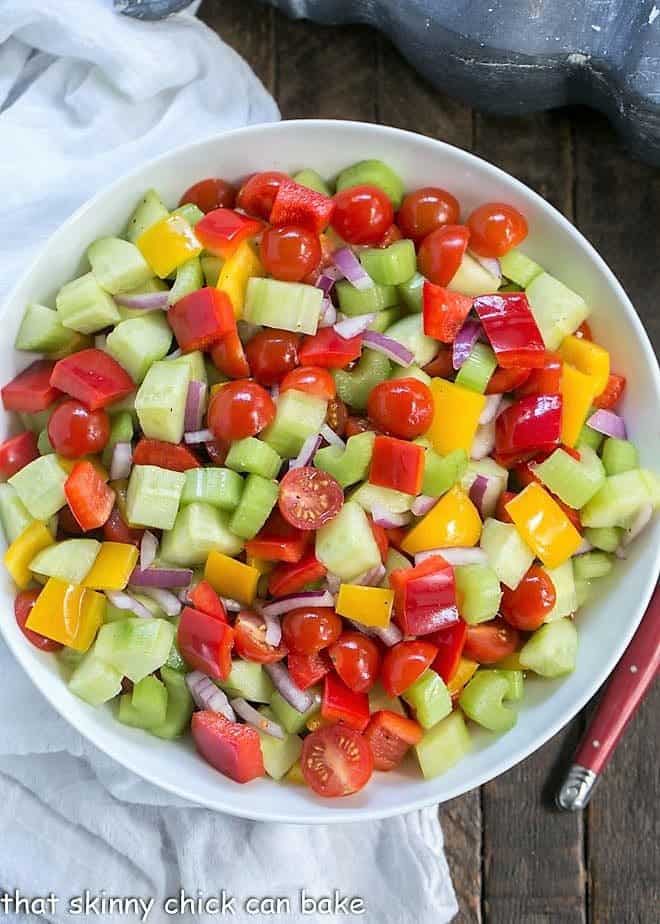 Overhead view of Marinated Vegetable Salad in a white salad bowl