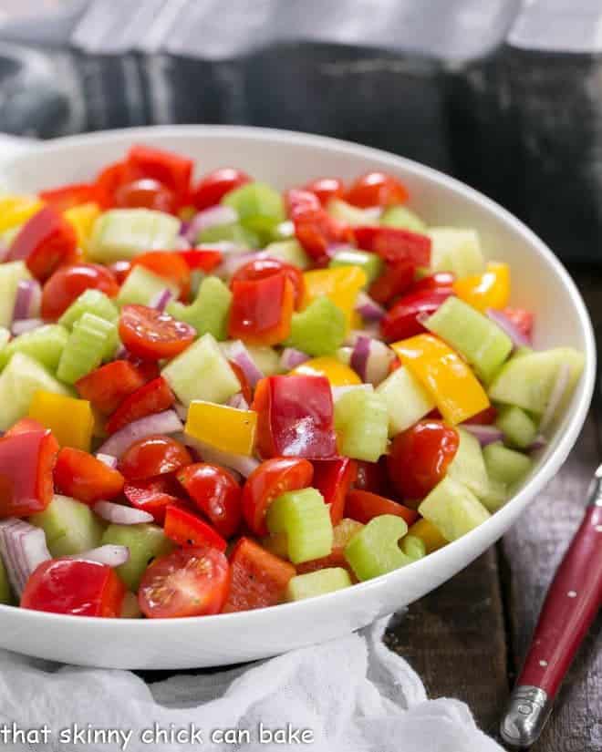 Marinated Vegetable Salad - a refreshing salad with a simple dressing and a touch of sweetness! Marinated Vegetable Salad in a white serving bowl