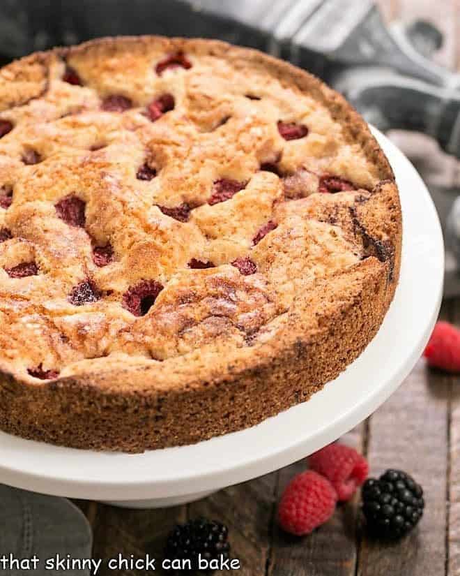 Top of a mixed berry torte with raspberries and blackberries.