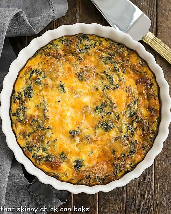 Overhead view of crustless spinach quiche.