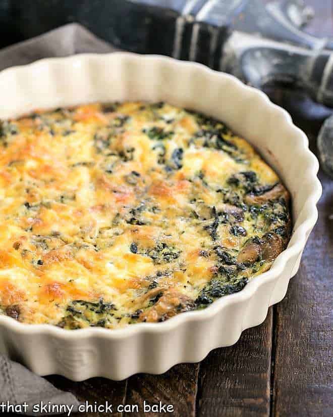 Crustless Spinach Quiche in a ceramic dish.