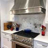 Tips for Renovating a Kitchen - range and hood featured image