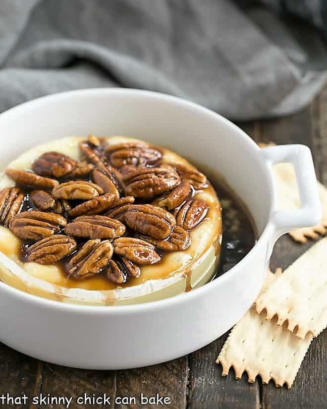 Kahlua Caramel Baked Brie in a small white casserole dish
