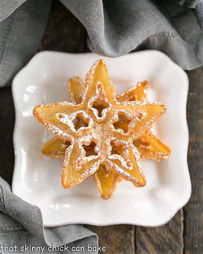 Two rosettes on a square white plate.