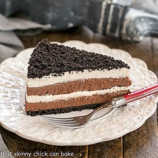 Slice of Layered Chocolate Cream Torte on a dessert plate