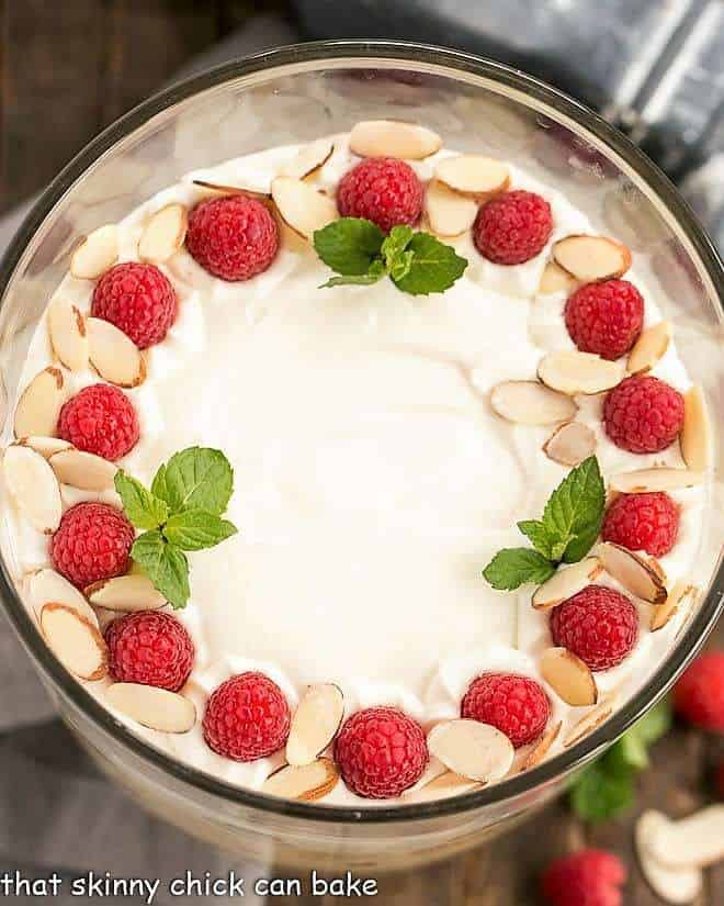 Overhead view of English trifle in a glass trifle bowl.