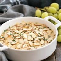 Parmesan Crab Dip in a white casserole dish