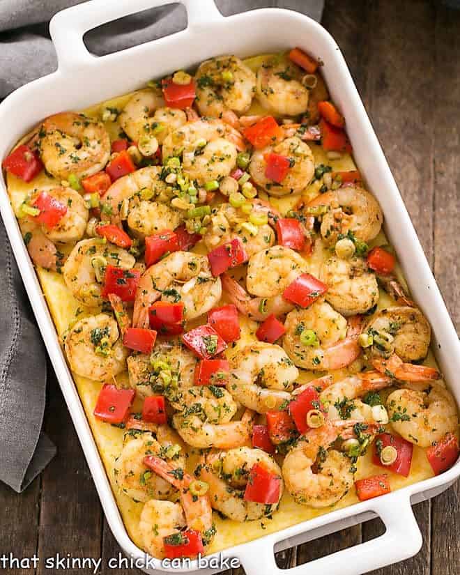 Cheesy Shrimp and Grits Casserole in a white, rectangular casserole dish.