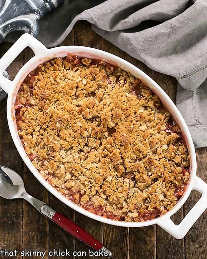 Overhead view of easy rhubarb crisp in a white casserole dish