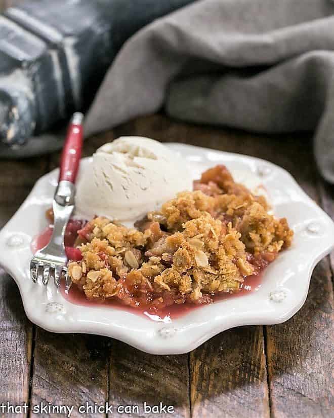 A serving of Easy Rhubarb Crisp on a white octagonal plate