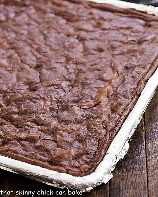 Sheet Pan Brownies in a baking sheet lined with non-stick foil.