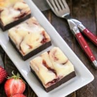 overhead view of Strawberry brownies on a white tray