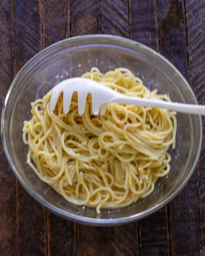 Spaghetti mixed with eggs and Parmesan.