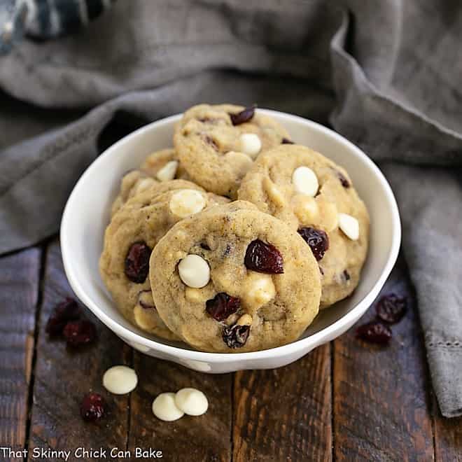 Cranberry white chocolate cookies in a white ceramic bowl