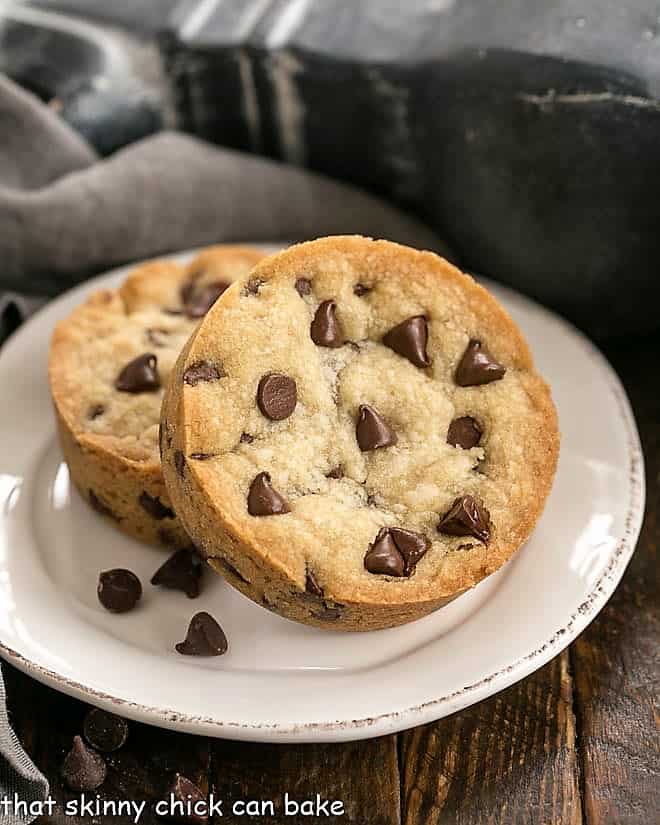 Chocolate Chip Cookie Bar for One - a small batch recipe that bakes up a big chocolate chip cookie in no time!! Two Chocolate Chip Cookie Bars for One on a white dessert plate.