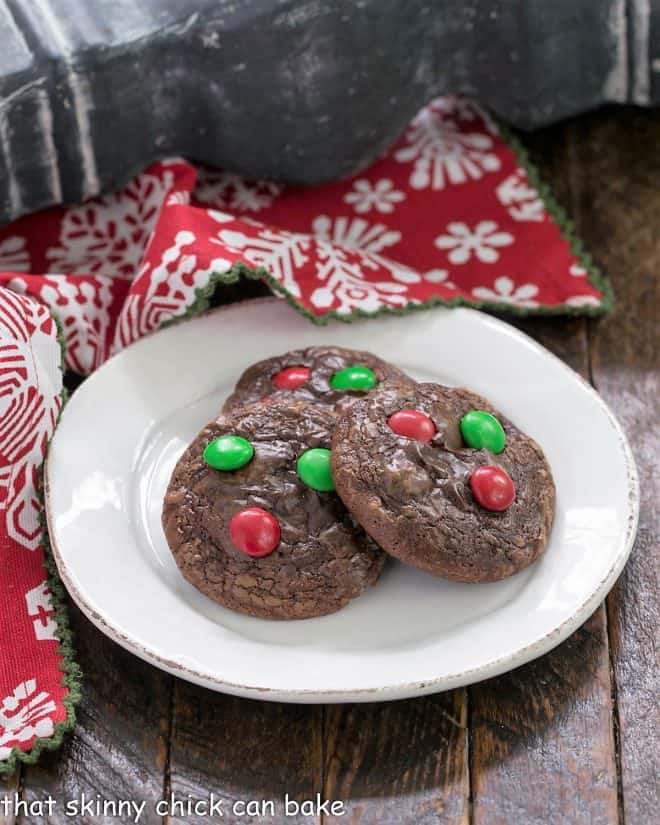 3 Holiday Truffle Cookies on a round white plate