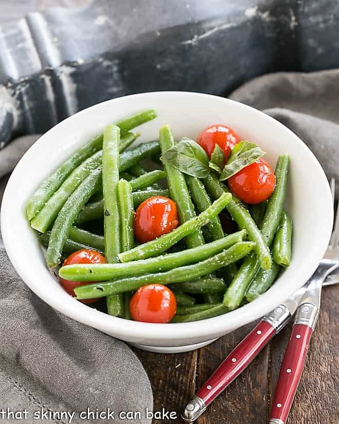 Overhead view of Italian Sauteed Green Beans in a white bowl. 