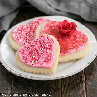 3 heart lofthouse cookies on a white plate