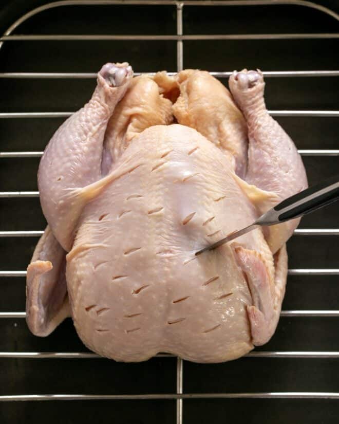 Slashing technique for preparing chicken.