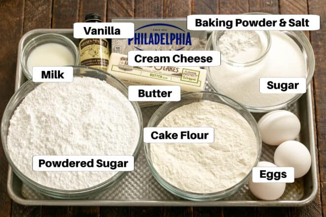 Gooey Bars ingredients with labels on a sheet pan.