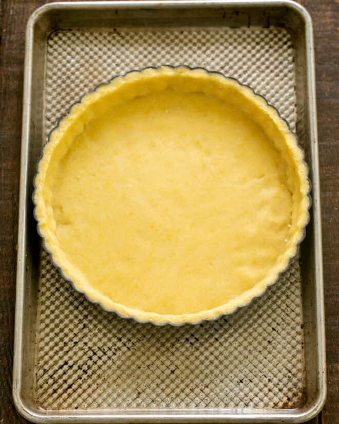 Pressed dough in tart pan.