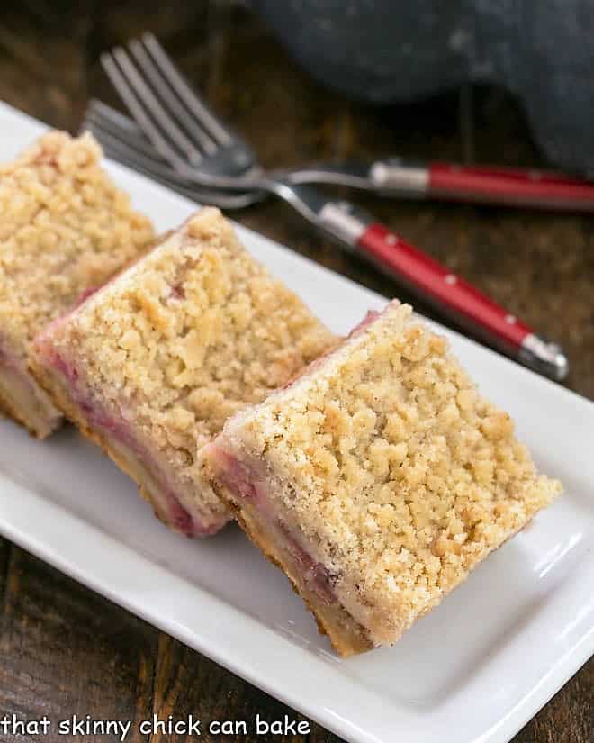 Streusel Topped Rhubarb on a white tray Bars.