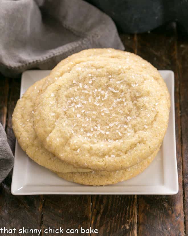 Overhead view of a stack of Big Homemade Sugar Cookies on a square white plate