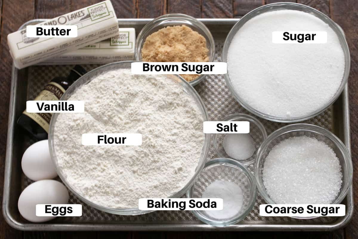 Giant Sugar Cookie Ingredients with labels on a metal sheet pan.